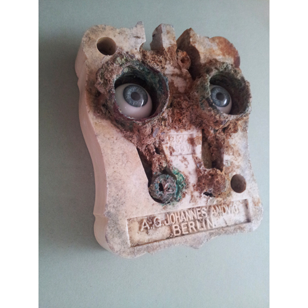 Long Island Lightman II- Found Object in porcelaine, handmade glasseyes-2013